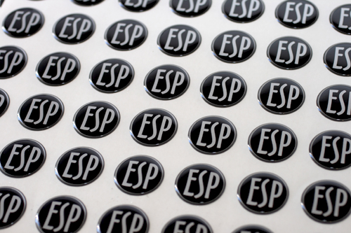 round 3D epoxy domed labels on sheet