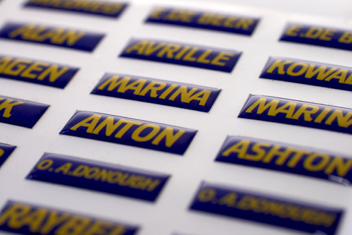 bright coloured personalised 3D epoxy domed nameplates with sharp corners