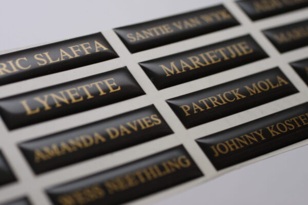 metallic gold personalised 3D epoxy domed nameplates with sharp corners