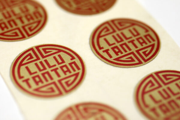 Gold metallic vinyl sticker with custom printed logo
